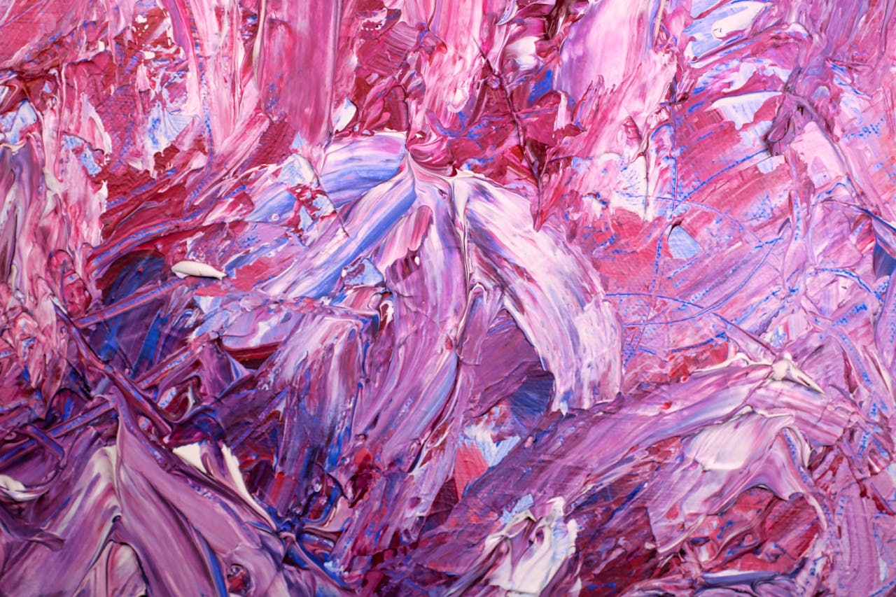 Dynamic abstract painting with vivid pink and purple hues, showcasing textured brush strokes.